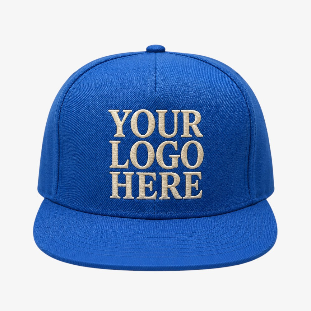 Vibrant blue five-panel snapback cap with flat brim and raised cream embroidery