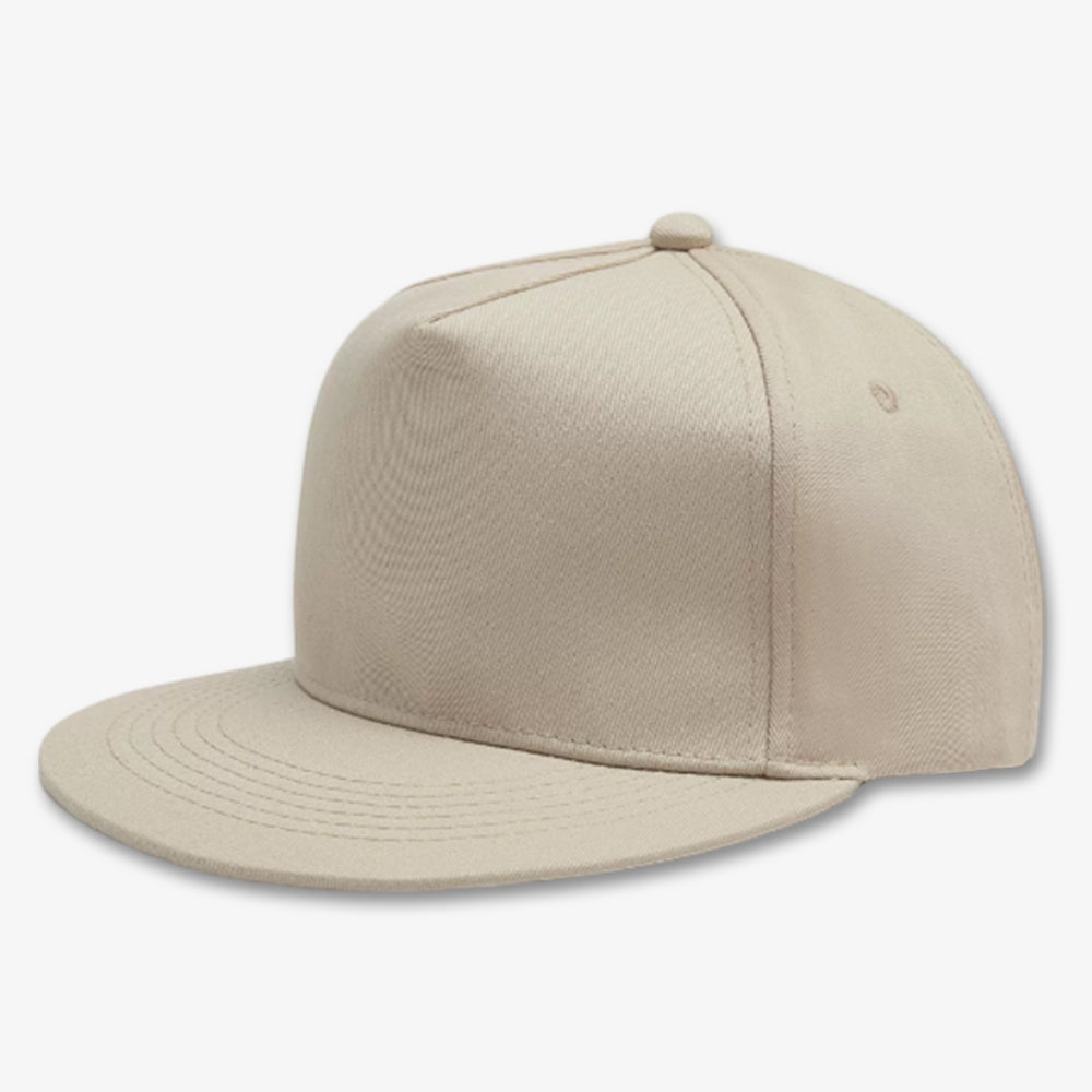 Beige five-panel snapback cap with flat brim, stitched eyelets, and structured crown