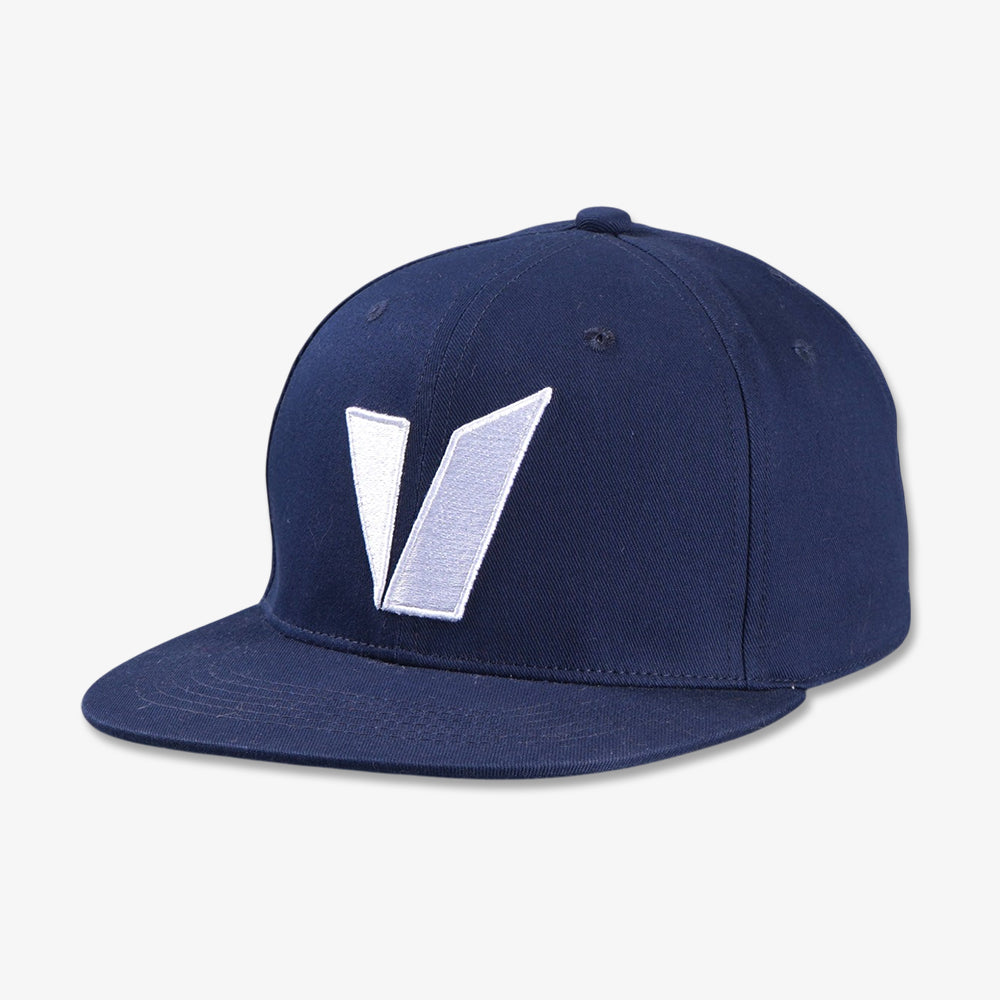 Navy blue six-panel snapback cap with flat brim and white embroidered V-shaped detail