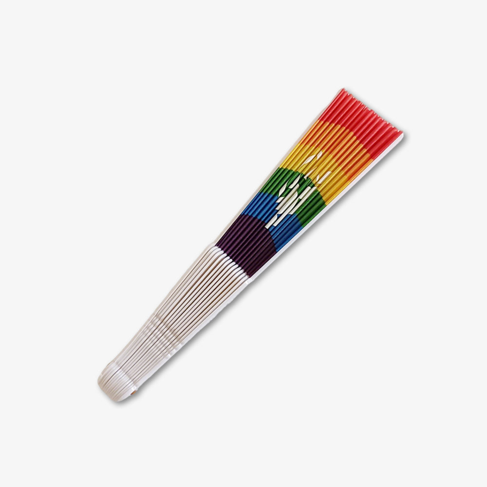 9-Inch rainbow striped fabric folding hand fan with peace sign, folded on plain white background