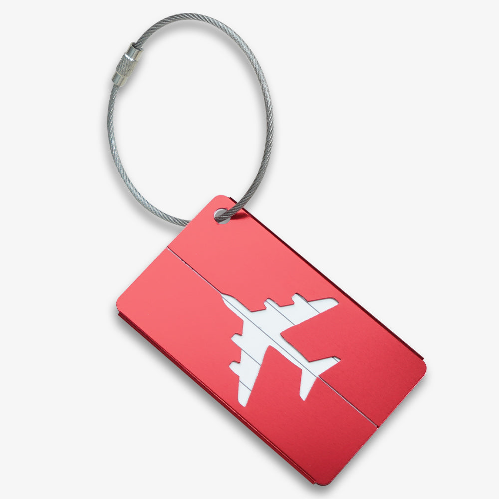 Red aluminum luggage tag with hollow airplane cutout and steel wire hanging loop