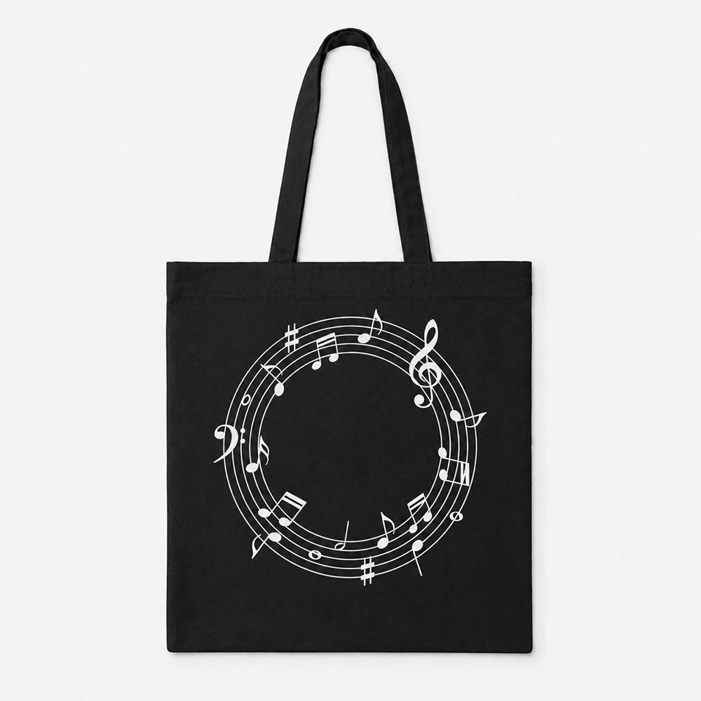 Black basic canvas tote bag printed with circular white musical note staff design
