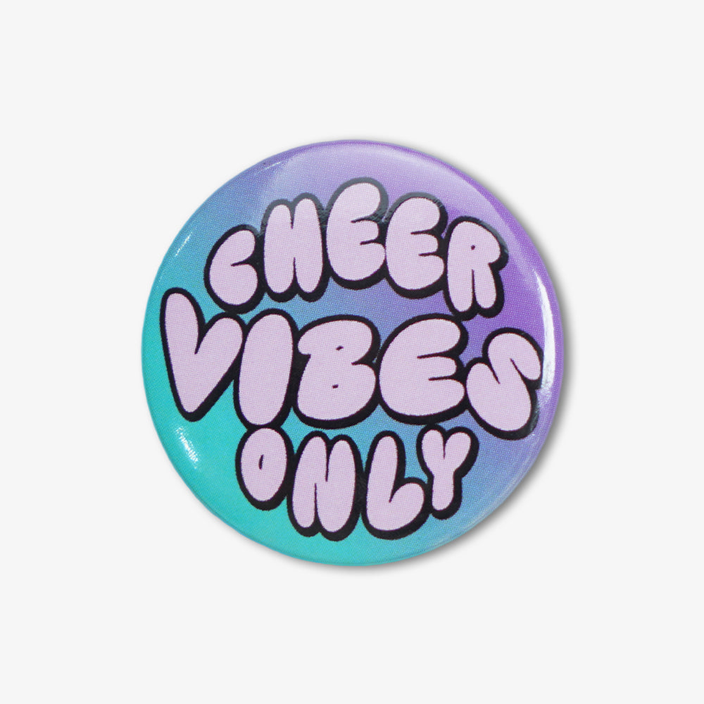 Button badge with teal to purple gradient background, printed with retro "CHEER VIBES ONLY" bubble lettering