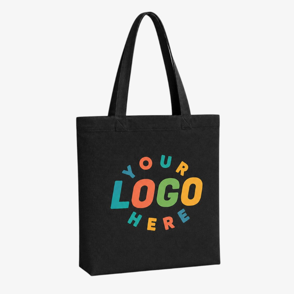 Black canvas tote bag with bottom, featuring colorful customizable "your logo here" print and sturdy top handles