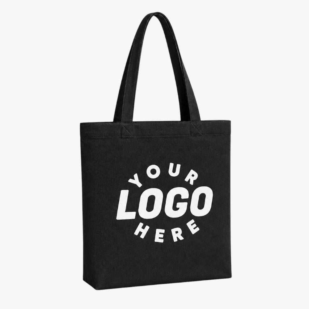 Black canvas tote bag with bottom, printed with "YOUR LOGO HERE" text for custom branding