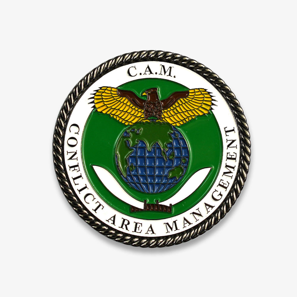 Challenge coin for C.A.M. Conflict Area Management, with enamel eagle, globe pattern and twisted rope metal border