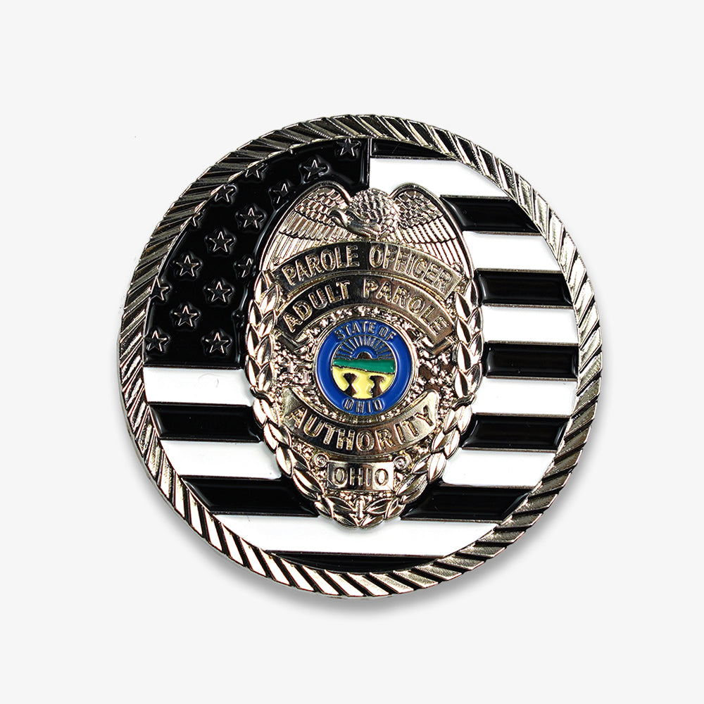 Challenge coin engraved with Ohio Parole Officer badge, black and white US flag design, polished silver enamel finish
