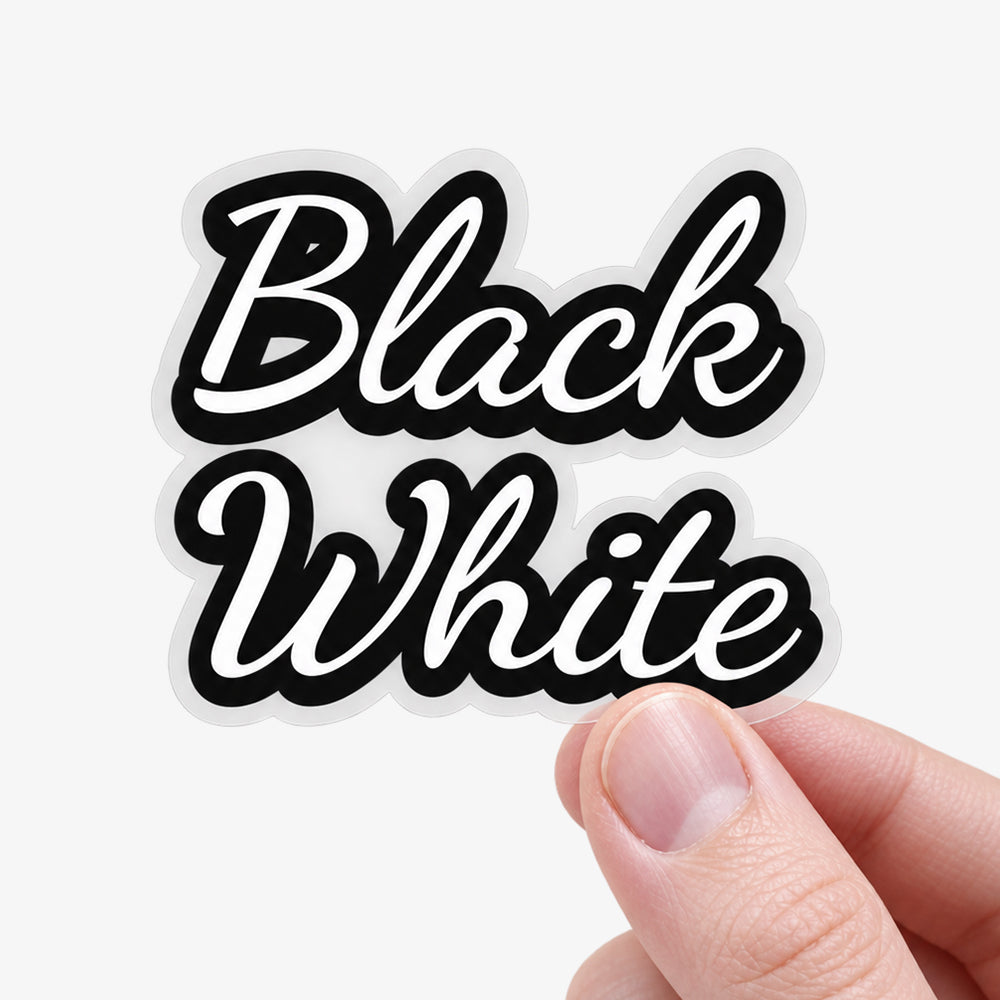 Clear transfer decal with bold black script text on transparent backing, held between fingers