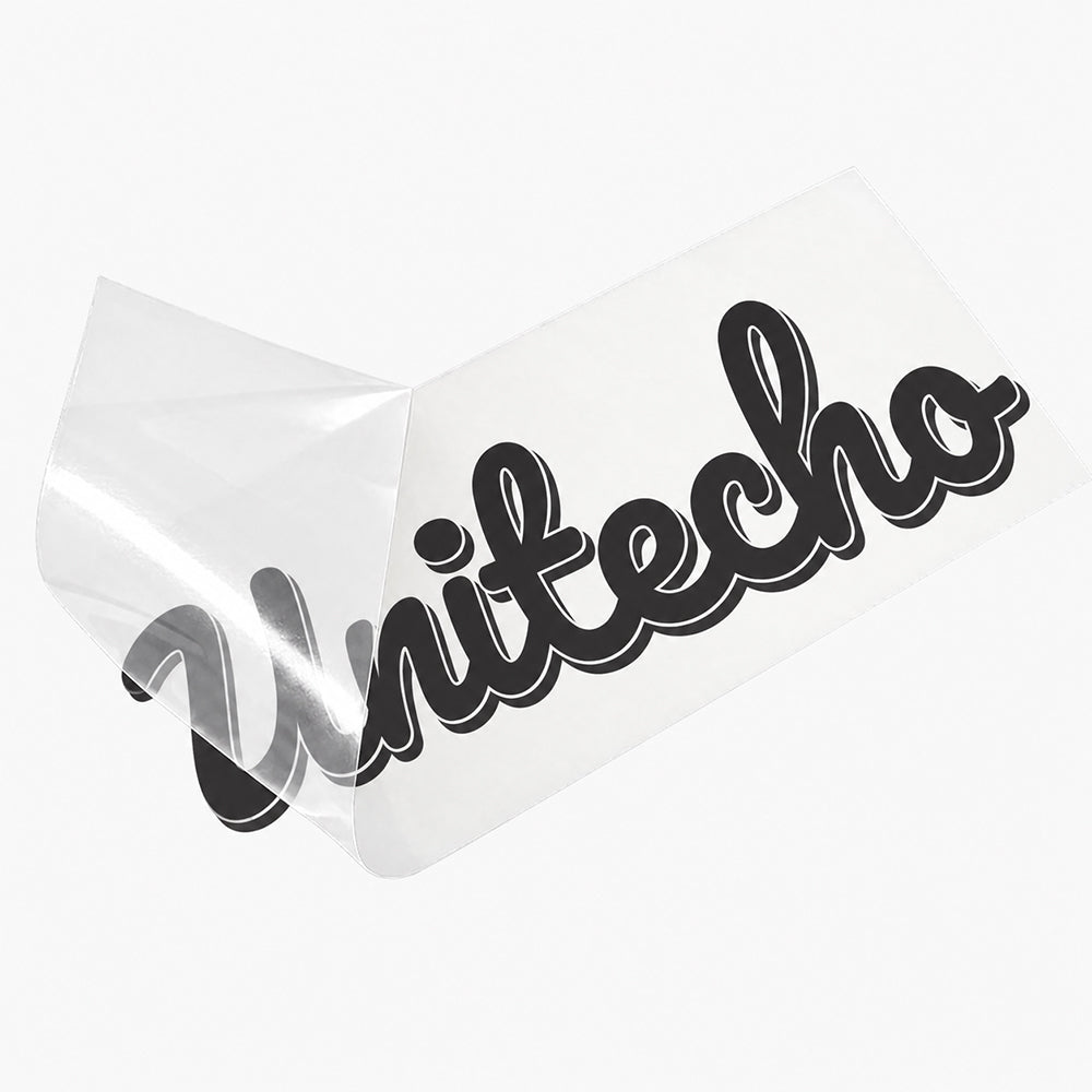 Clear transfer decal with black cursive lettering and a glossy transparent backing sheet