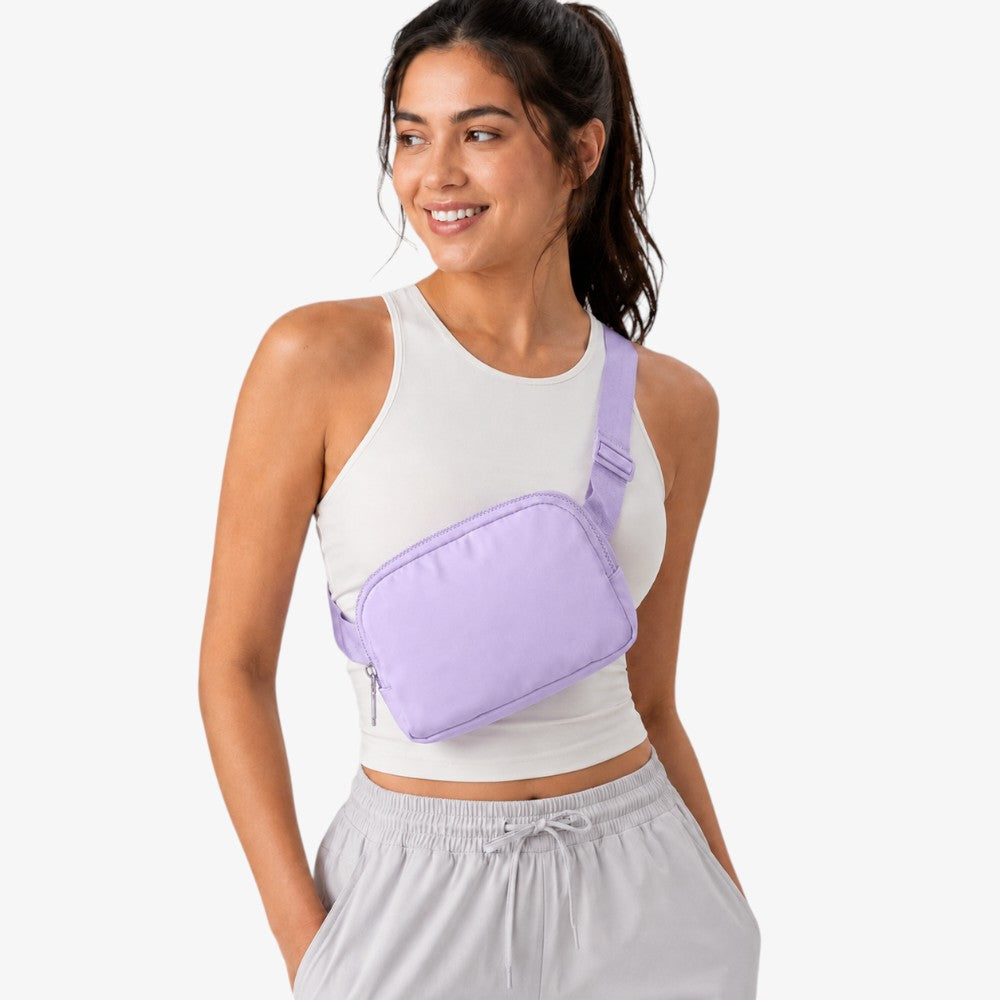 Lavender crossbody fanny pack with adjustable strap and front zipper pocket