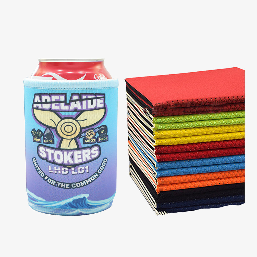 Custom 12 oz. Folding Can Coolers, custom printed can sleeve beside stacked assorted colorful blank cooler