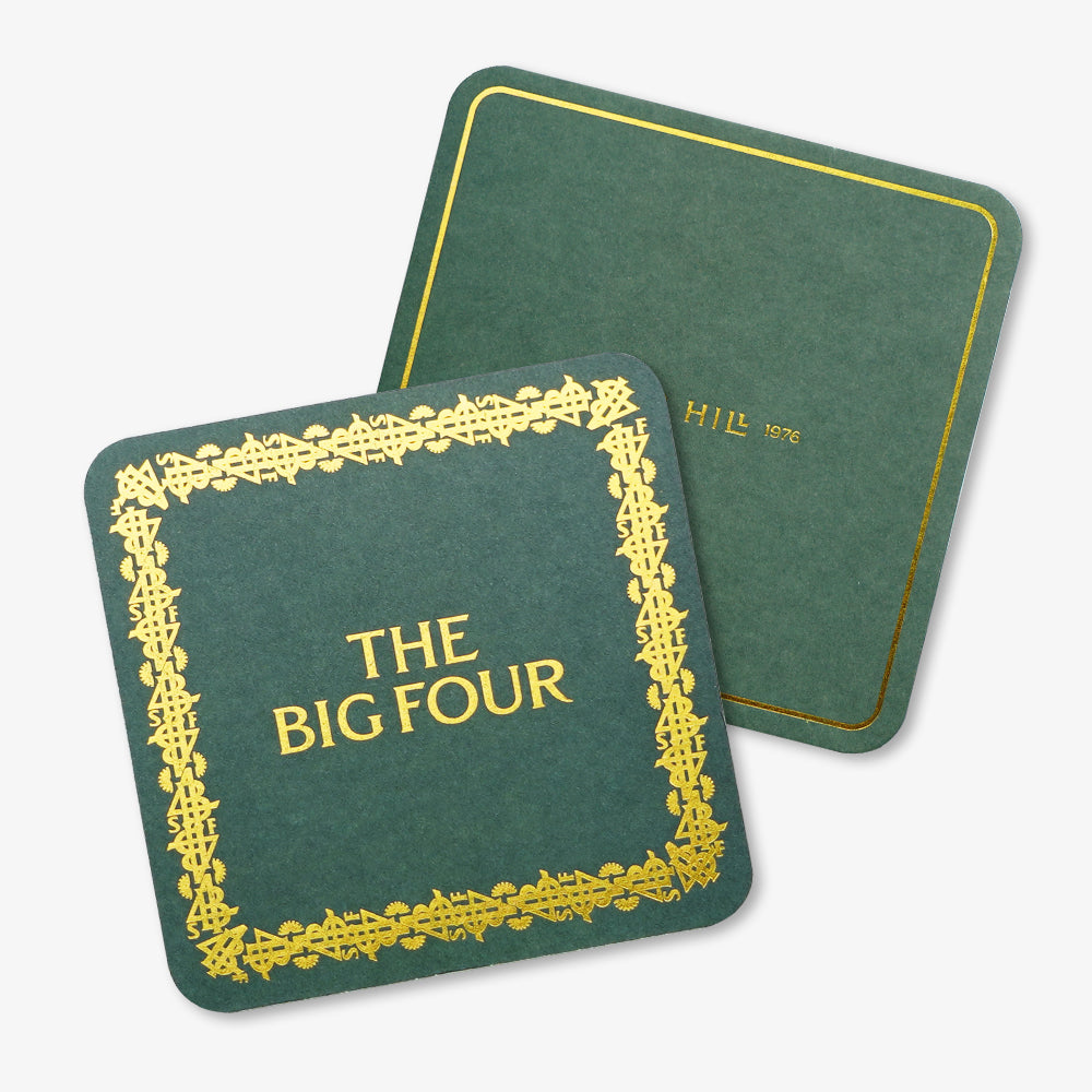Custom pulpboard coasters, dark green with elegant gold foil printed text and decorative borders