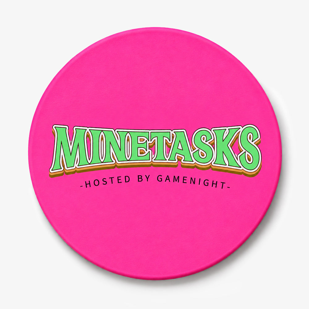 Round pink PVC coaster with bold green lettering and brown outline detailing