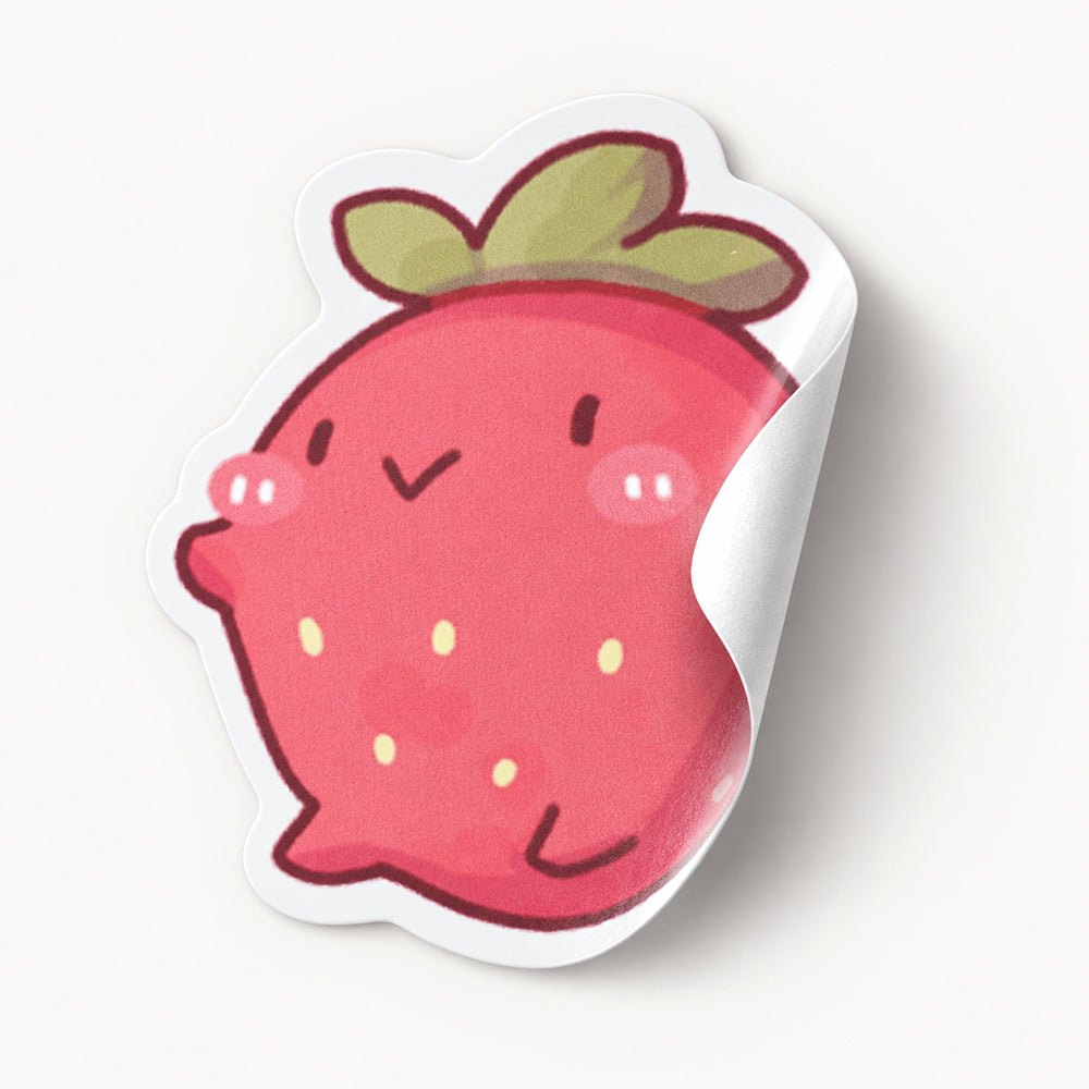 Die cut sticker shaped like a smiling pink strawberry with green leaves and yellow seeds