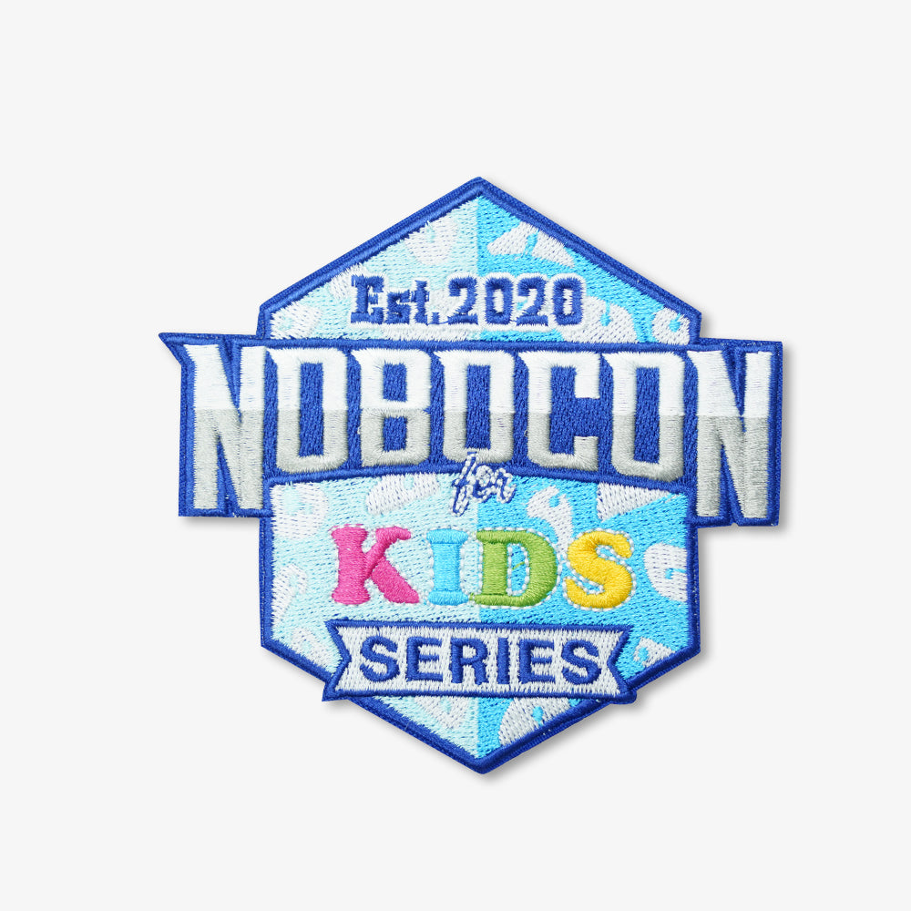 Custom embroidered NOBOCON for Kids Series patch, diamond shaped, blue base with vibrant multicolor playful lettering