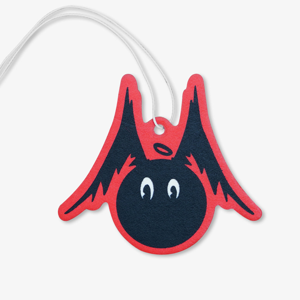 Hanging air freshener, cute cartoon black character with bat wings and halo, red trim, white hanging string