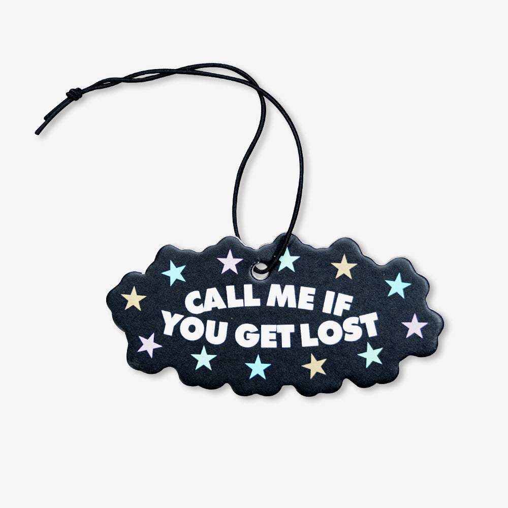 Black cloud-shaped hanging air freshener printed with "Call Me If You Get Lost" text and pastel stars, with black hanging string
