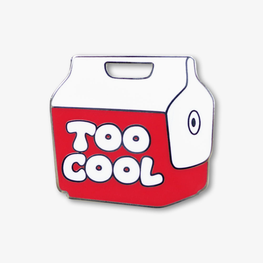 Hard enamel pin shaped like red and white takeout box, printed with bold "TOO COOL" text, polished silver metal border