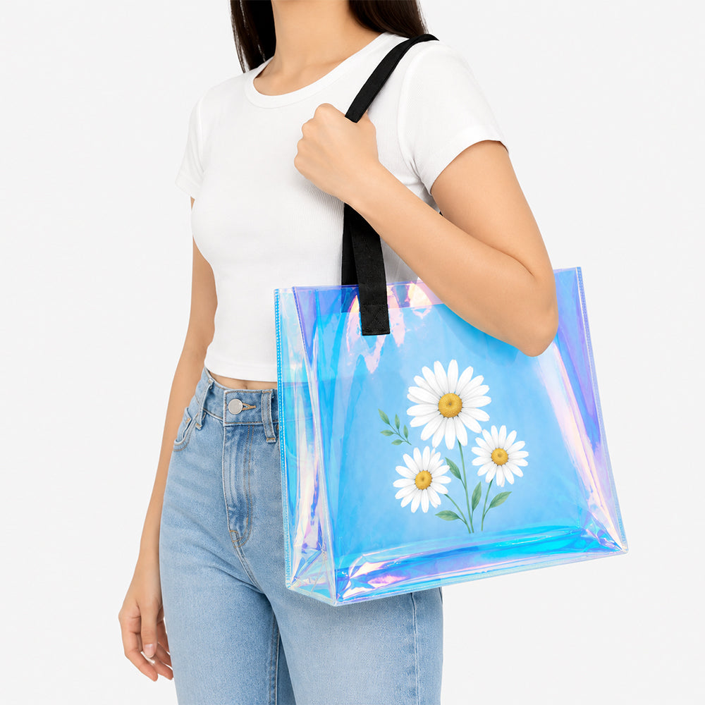 Holographic PVC tote bag with daisy floral print, iridescent clear finish, woman carrying it on her shoulder