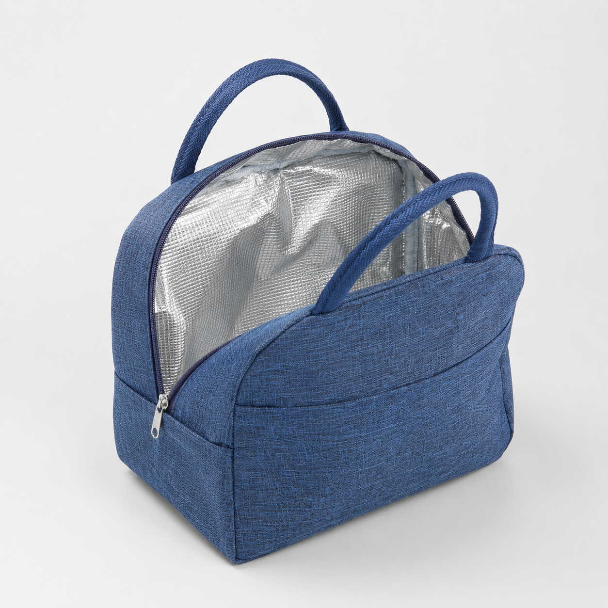 Blue insulated lunch bag with textured fabric, silver thermal lining, and dual top handles