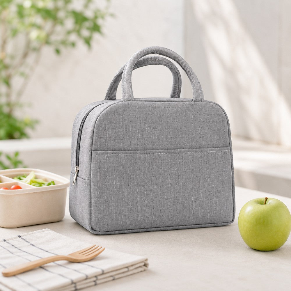 Gray insulated lunch bag with top handles, front pocket, and zipper closure