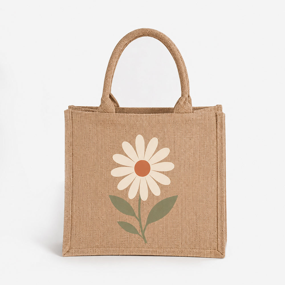 Light brown jute tote bag with printed daisy flower design, woven textured reusable casual shopping handbag