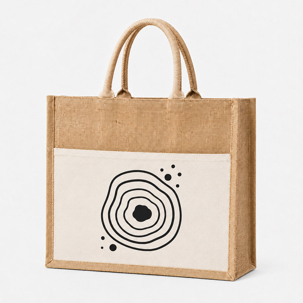 Jute tote bag with front pocket, printed with minimalist black abstract concentric pattern on cream canvas front panel