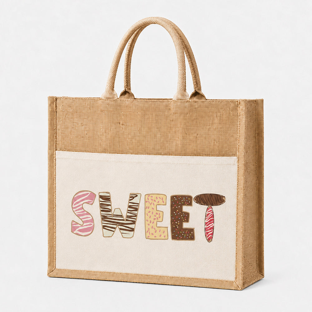 Jute tote bag with front pocket printed with candy-style SWEET lettering, natural burlap with woven top handles