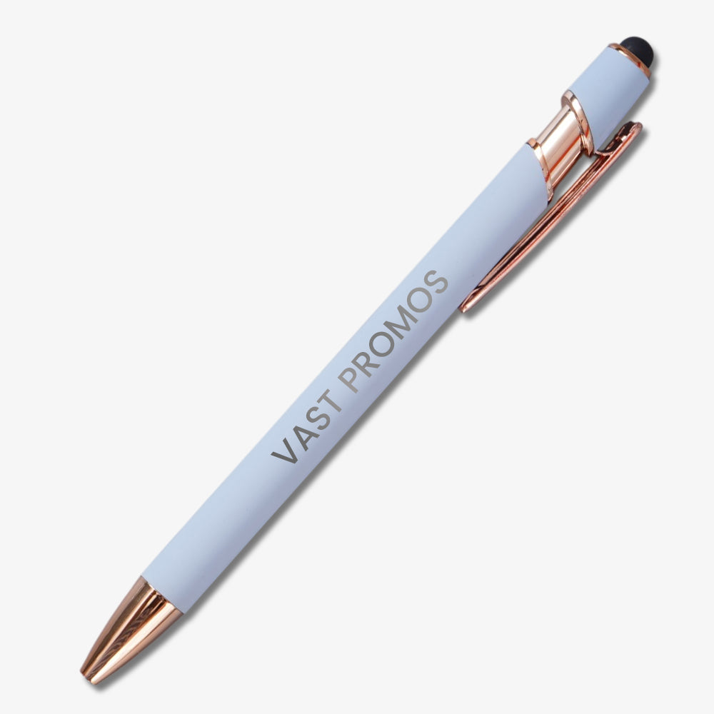 Plain stylus ballpoint pen with light blue matte body, rose gold accents, custom engraved VAST PROMOS text and top stylus tip