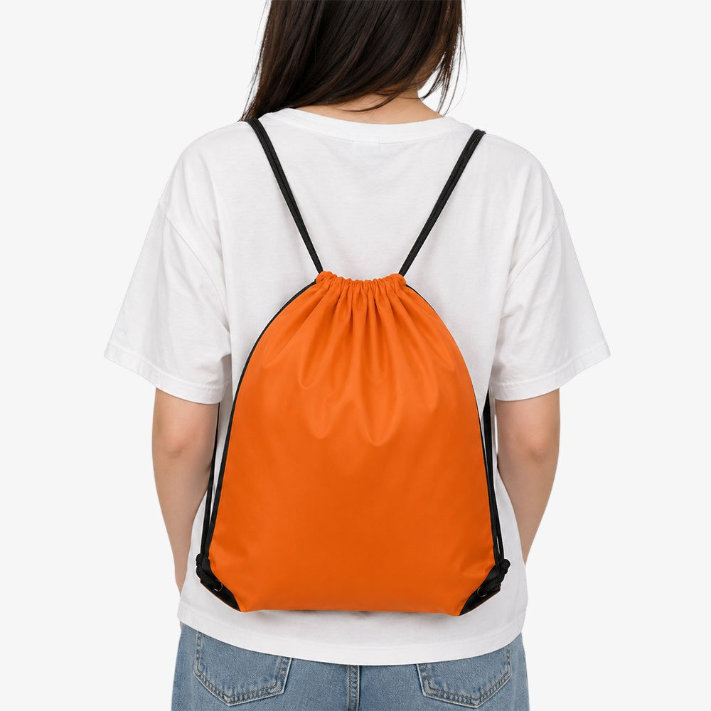 Bright orange polyester drawstring bag with black straps, worn on a person's back as a casual lightweight backpack
