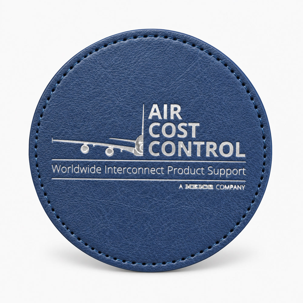 Round blue leather coaster with visible stitching and a debossed airplane graphic