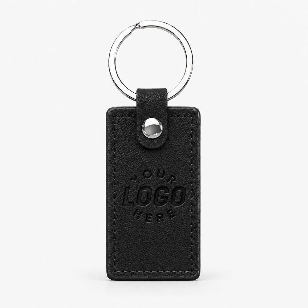 Black PU leather keychain with silver ring, stitched edges, and snap-button strap