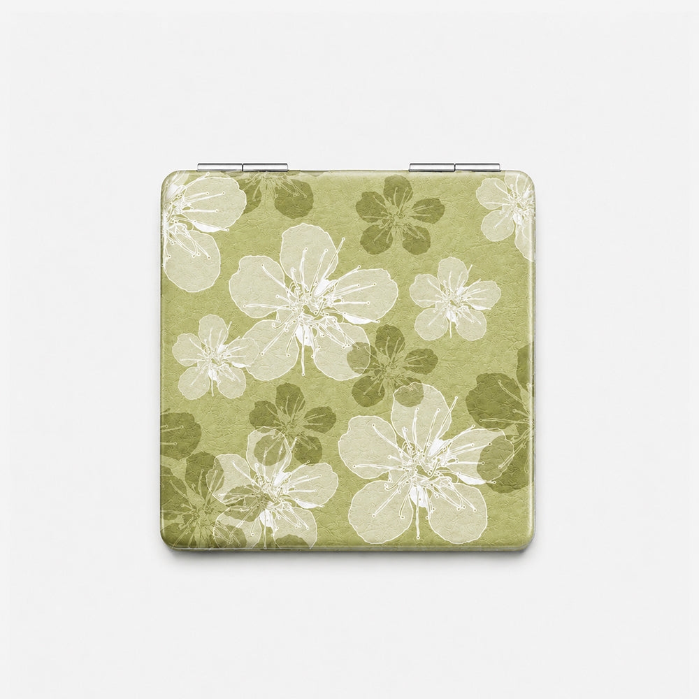 Folding compact mirror with olive green PU leather cover featuring white floral print and silver hinge