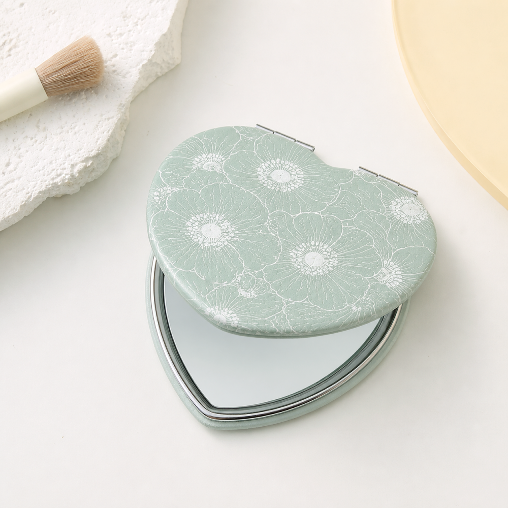 Heart-shaped PU leather compact mirror with white floral pattern and silver hinge