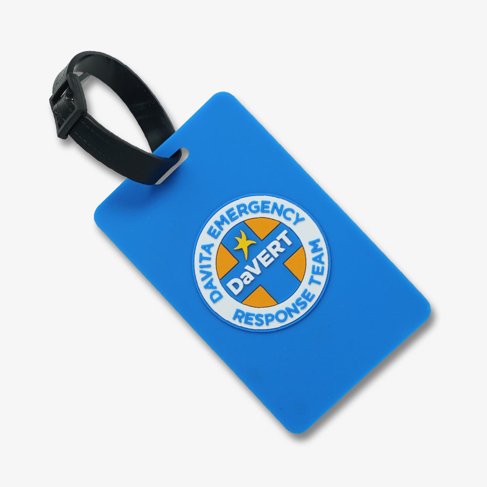 Blue custom PVC luggage tag with embossed Davert Emergency Team logo and black adjustable strap
