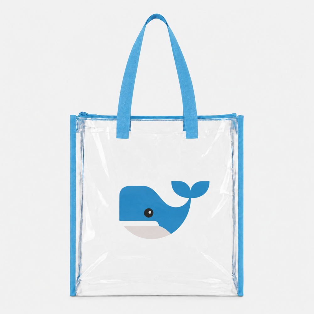 Clear PVC tote bag with blue trim, fabric handles and cute cartoon blue whale graphic printed on front