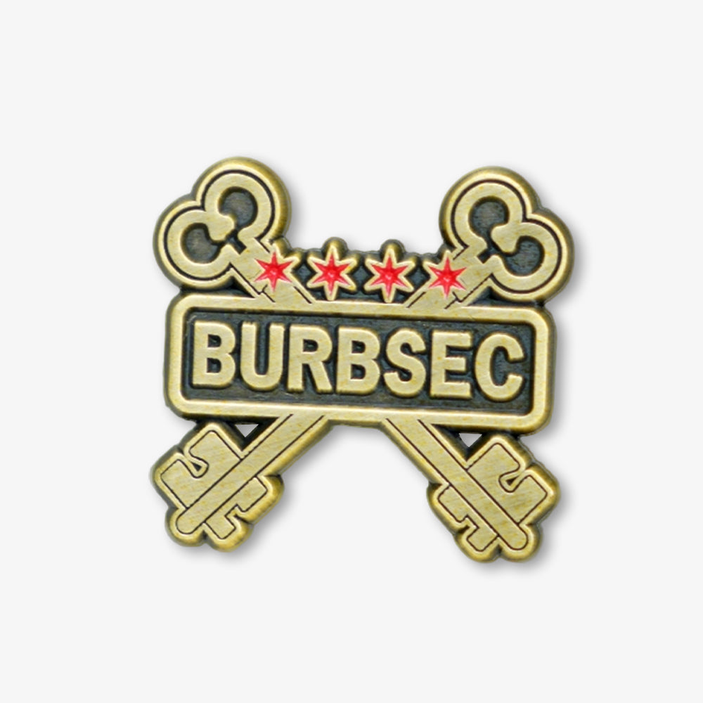 Soft enamel pin with antique brass finish, crossed skeleton keys, red stars and embossed BURBSEC lettering