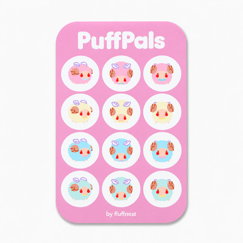 Pink sticker sheet with twelve circular stickers featuring cute pastel-colored puffball characters in pink, yellow, and blue tones