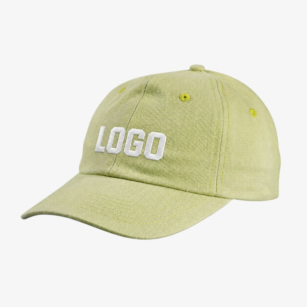 Light green unstructured dad hat with white embroidered lettering and curved brim