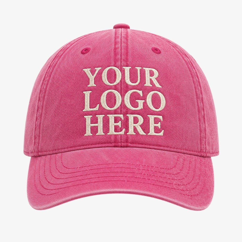 Pink washed cotton baseball cap with curved brim and embroidered front panel